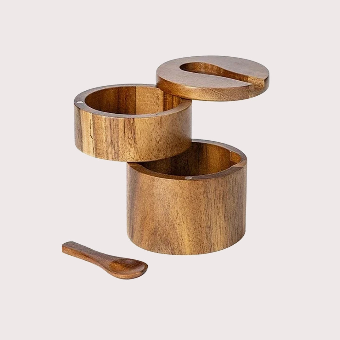 rustic wooden salt shaker with spoon

